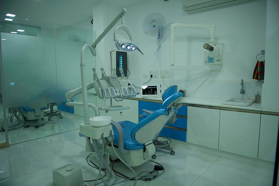 A dental care clinic with medical equipment, providing essential oral hygiene care treatment services.