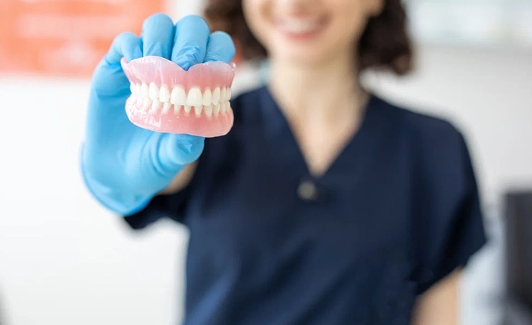 Restore your smile and improve oral health with comfortable, natural-looking dentures.